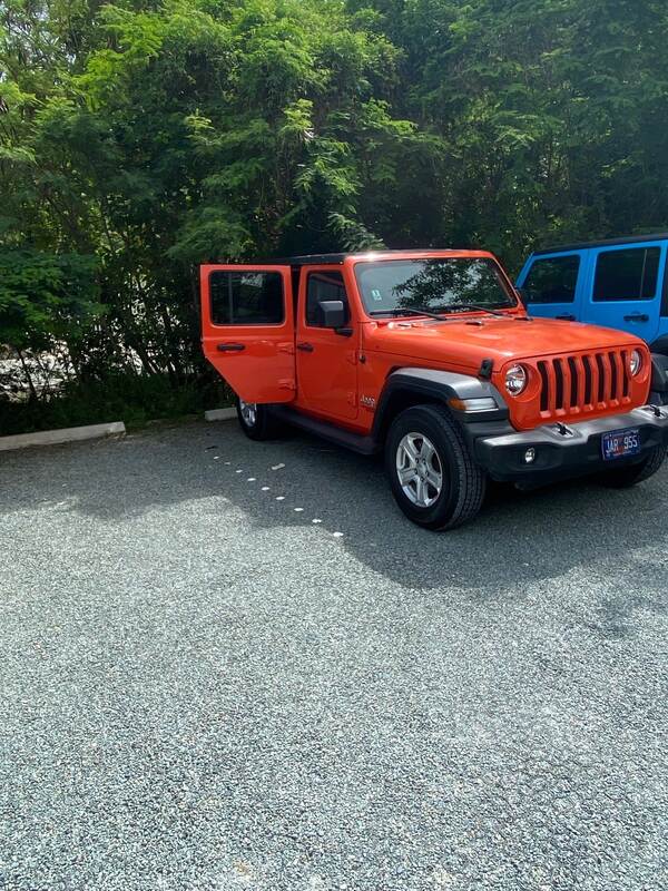 Jeep parked on a completed gravel paver driveway installation
