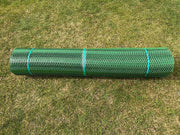 Close-up of a rolled Mudstop grass protection mesh roll showing diamond weave texture
