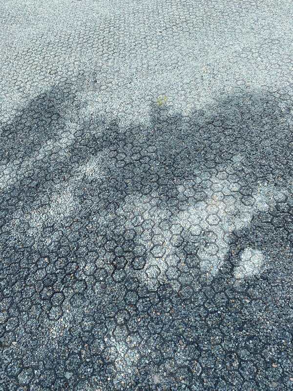 Close-up of NDS gravel paver grid cells filled with compacted crushed stone
